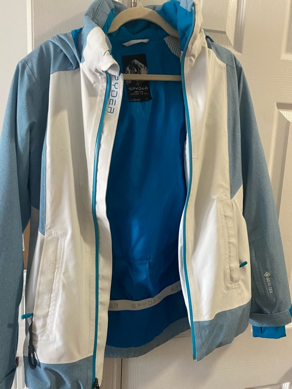 Spyder Women's White and Light Blue Ski Jacket with Bright Blue Lining